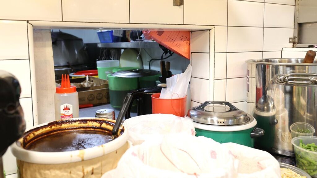 The thief is believed to have crawled into the stall's kitchen through the food pass-through opening that connects the front counter to the back kitchen.