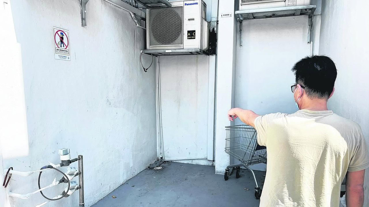 Foreign workers drink and pee in Hougang void deck, residents complain about unbearable stench