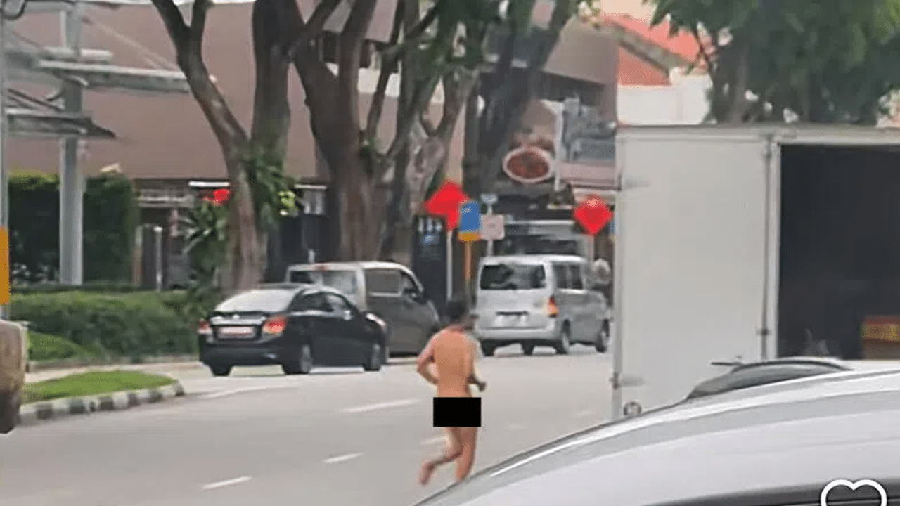 Injured motorcyclist flung onto taxi roof after crash walks 1.5km to Jalan Besar, then starts running naked