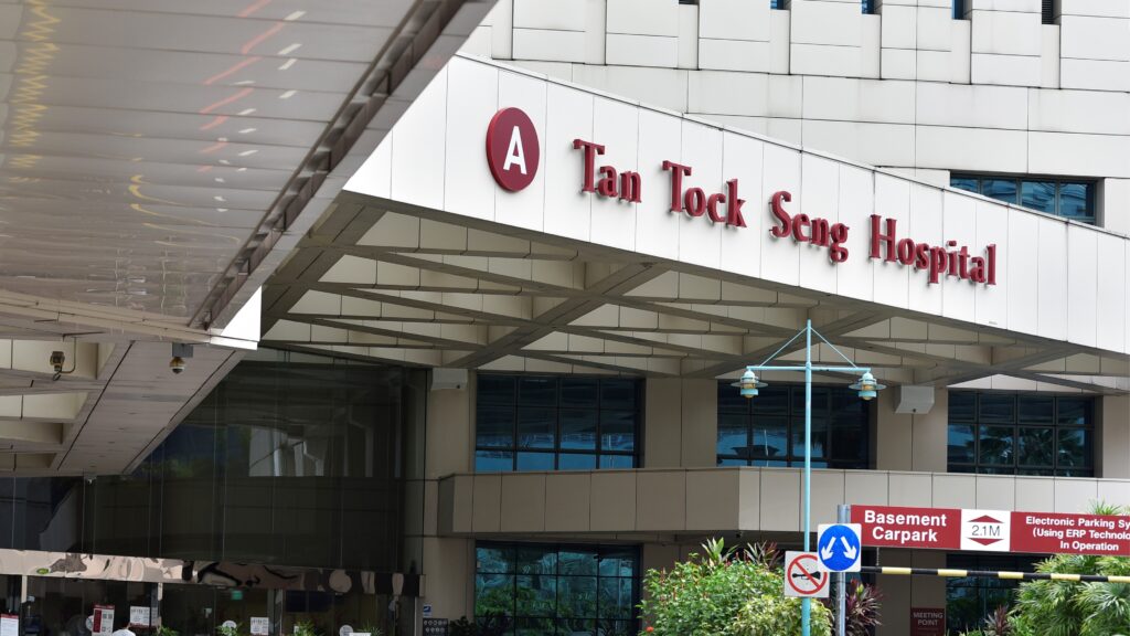 Modern Tan Tock Seng Hospital exterior entrance showcasing healthcare excellence and medical services.