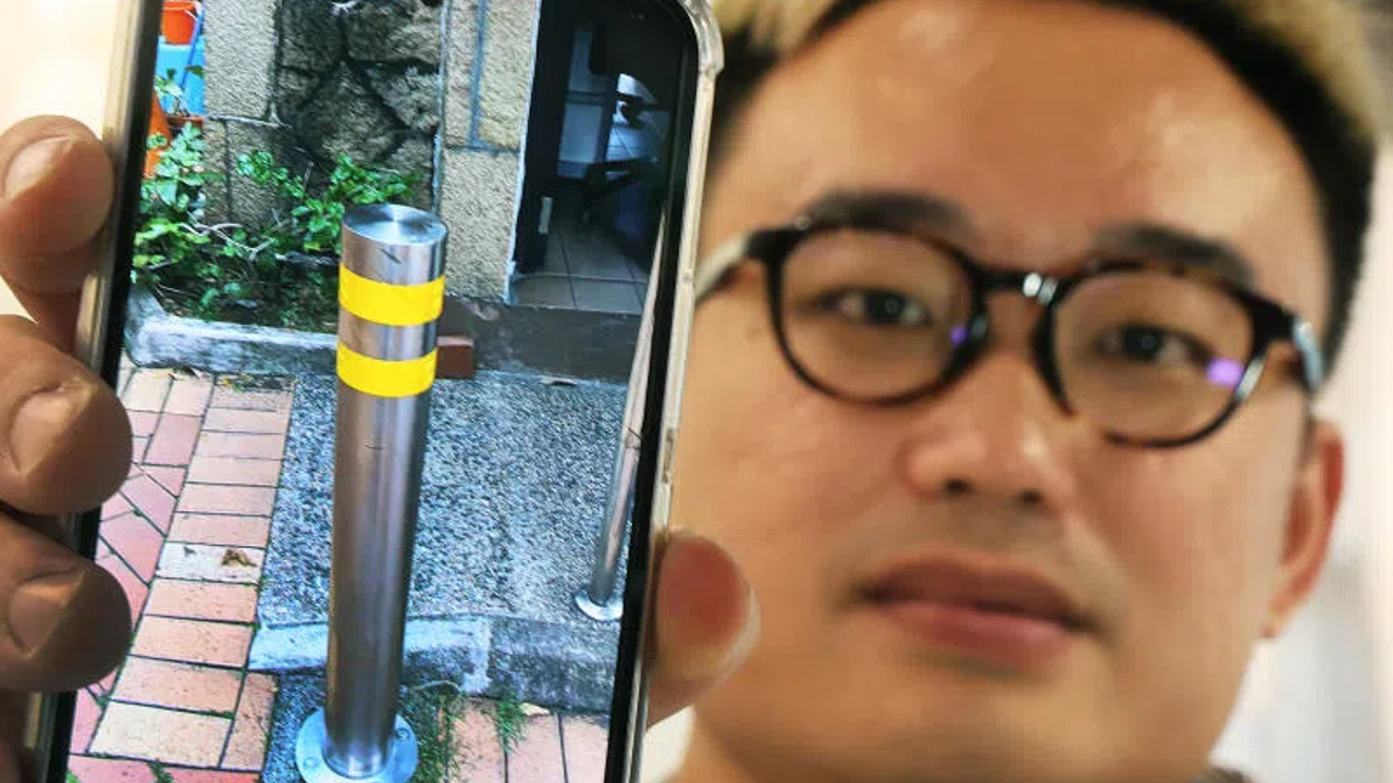 Lorry’s wheel kena locked after scraping condo traffic pillar, driver asked to pay S$500 deposit