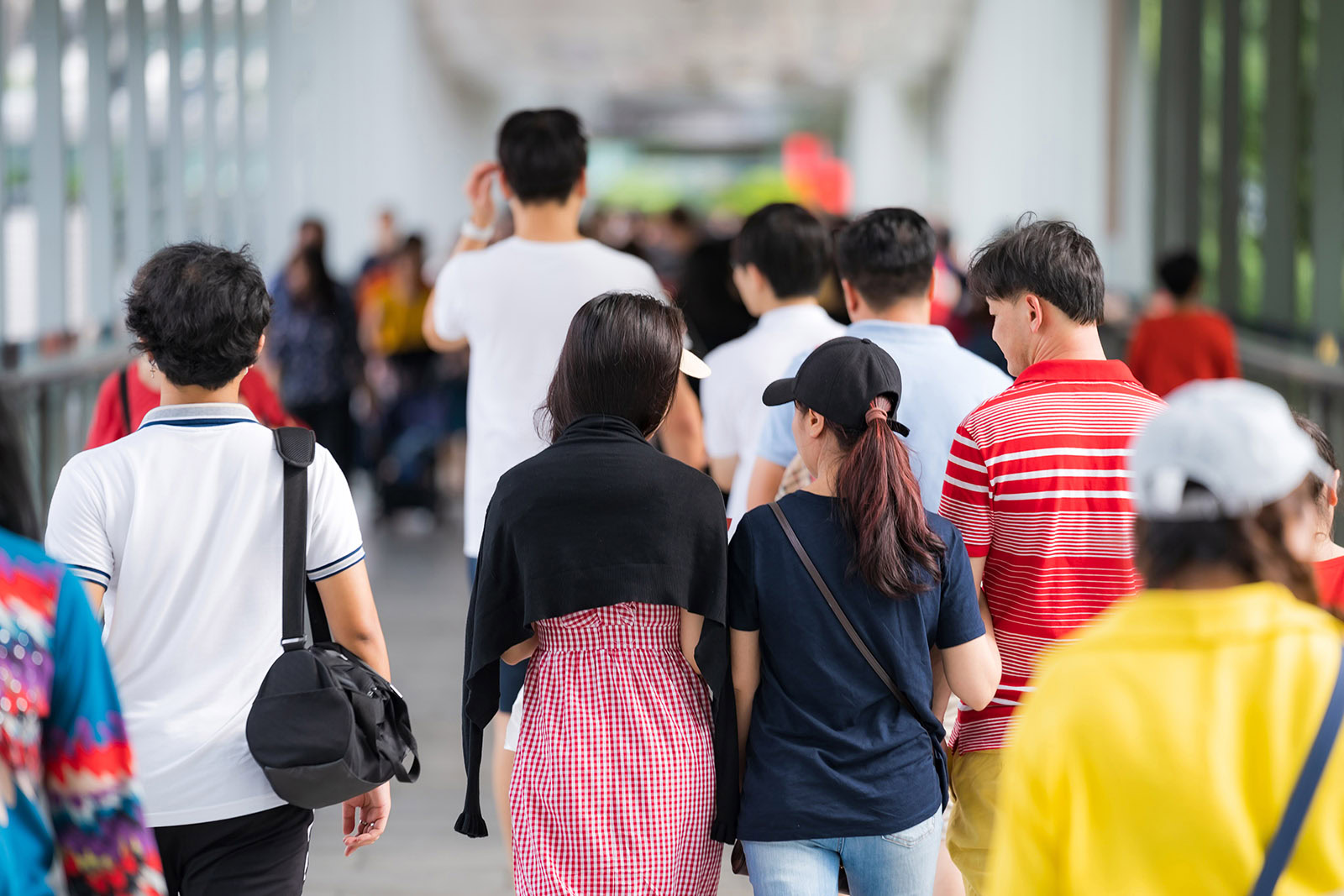 People waiting in line at Sure Boh, a popular and lively food experience in Bangkok.