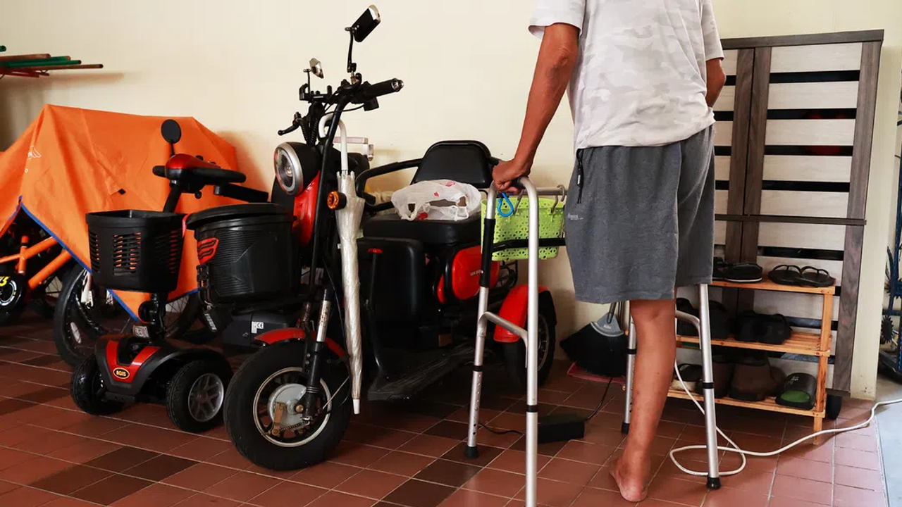Woodlands resident with amputated leg charges PMA along corridor, neighbours worried about fire risk